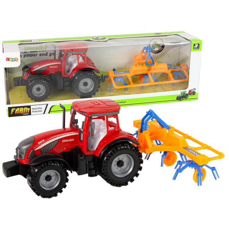 Červený traktor s hrabľami – trecí pohon