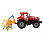 Červený traktor s hrabľami – trecí pohon