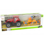 Červený traktor s hrabľami – trecí pohon