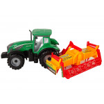 Zelený traktor s oranžovým kultivátorom