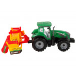 Zelený traktor s oranžovým kultivátorom