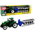 Zelený traktor s pluhom Zelený traktor s pluhom