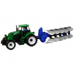 Zelený traktor s pluhom Zelený traktor s pluhom