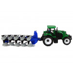 Zelený traktor s pluhom Zelený traktor s pluhom