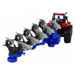 Červený traktor s pluhom Červený traktor s pluhom