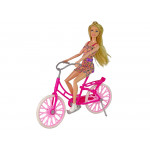 Bábika na bicykli