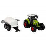 Traktor s bielym prívesom