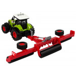 Traktor s červeným prívesom